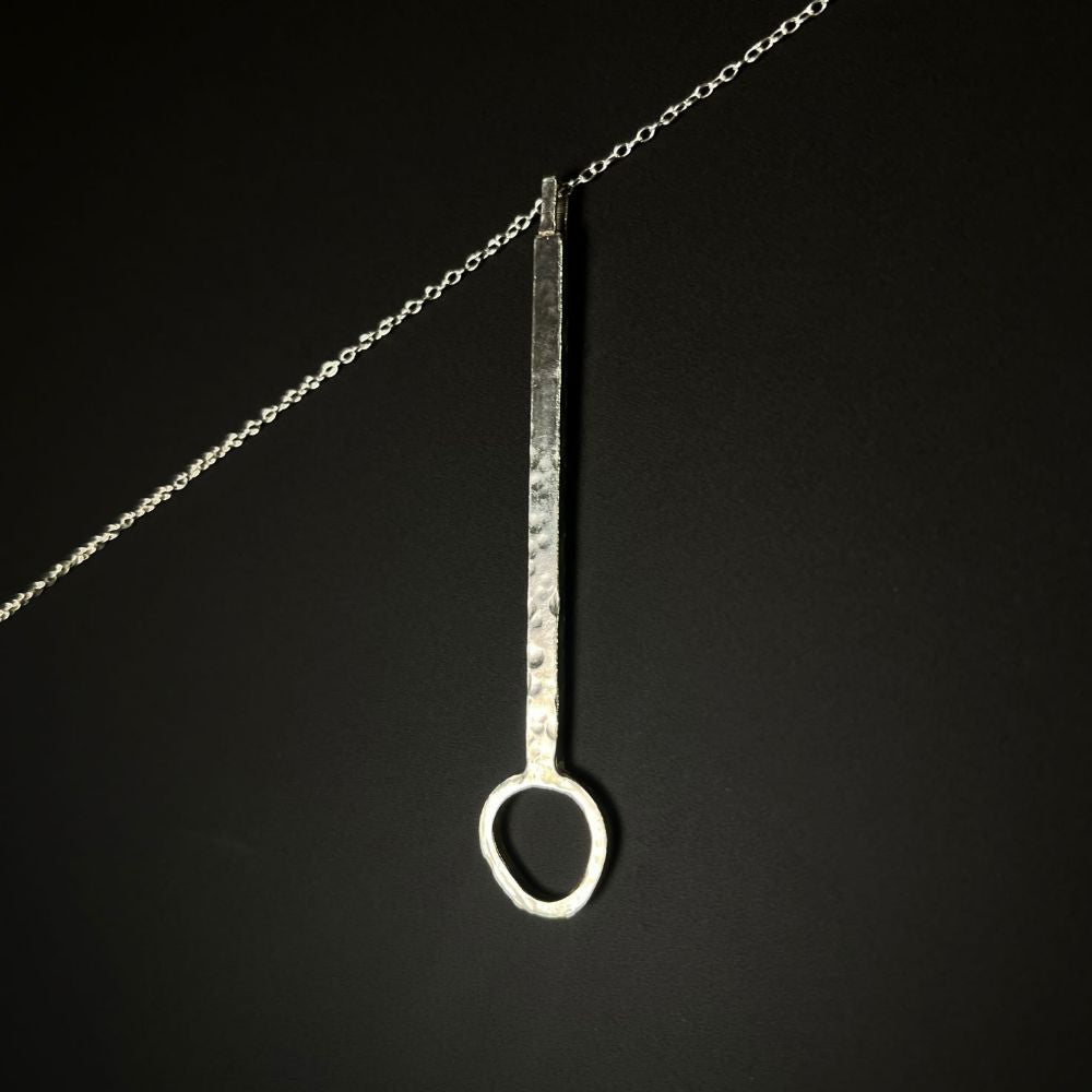 LONG HAMMERED SILVER PENDANT